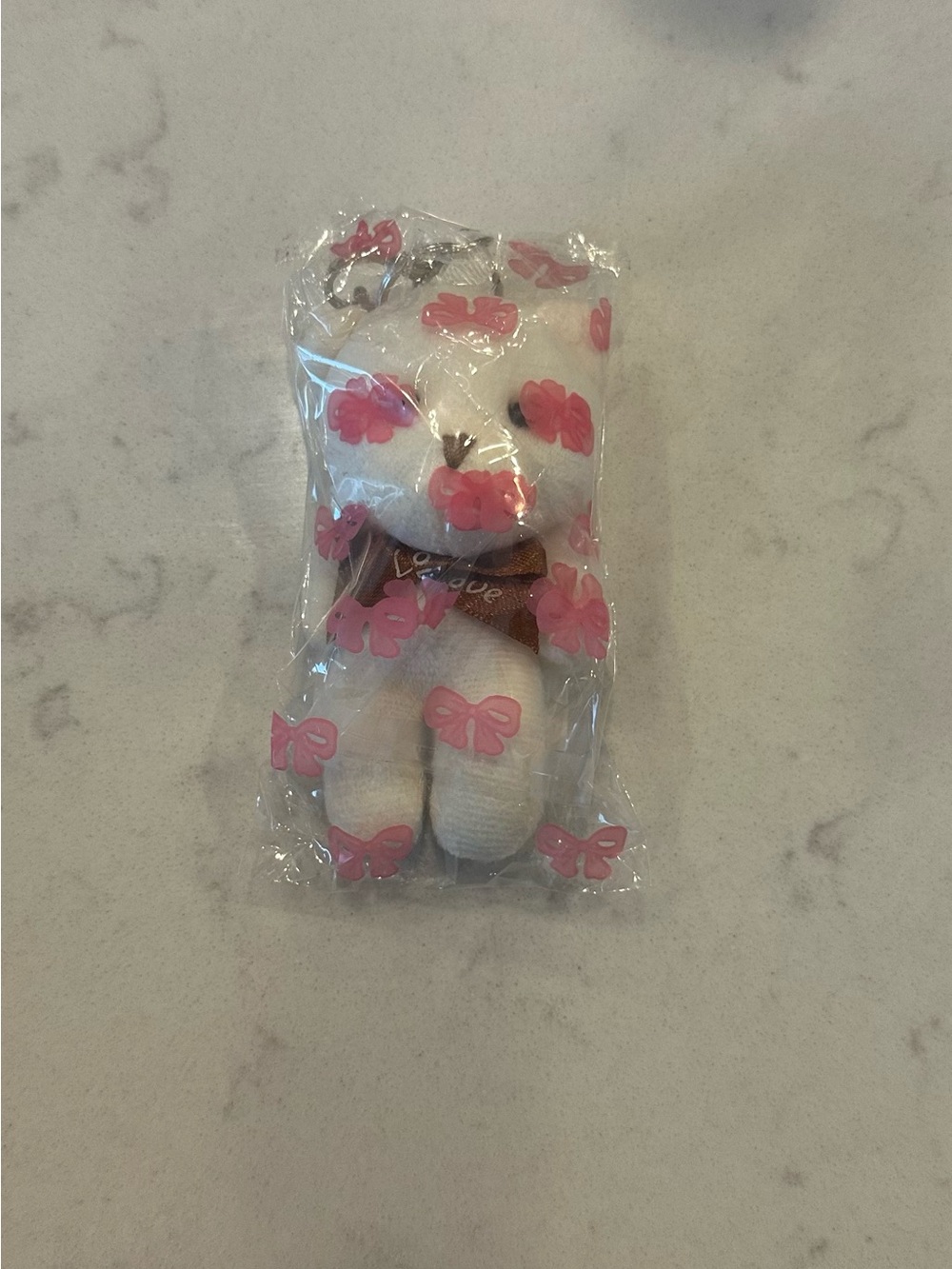 White Plush Bear with Brown Bow